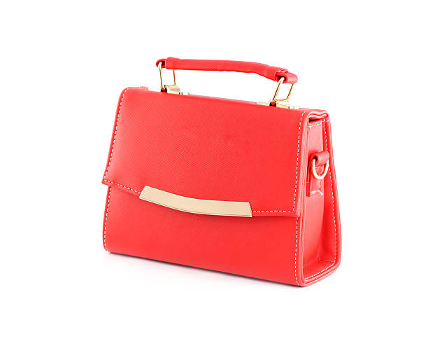 istock Red handbag of texture leather isolated on white. 507062019