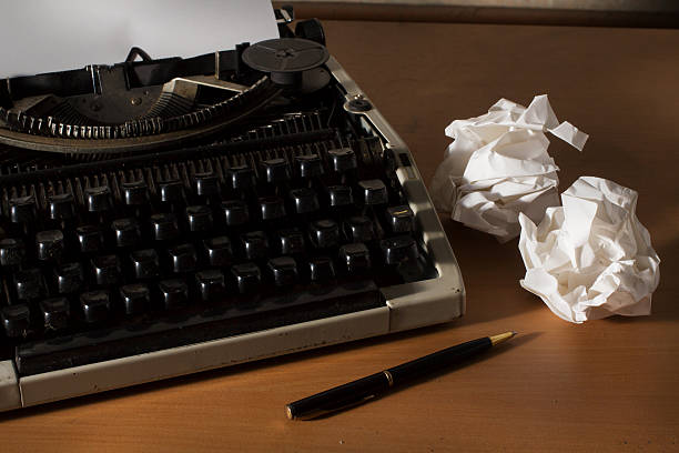 istock Old style office table,Typewriter with paper and pen, 507063251