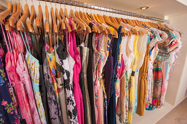 istock Womens clothes hanging on rail 507066449