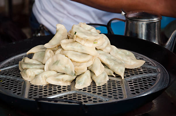 istock “Chinese dumpling” steamed Chinese dumplings 507067496