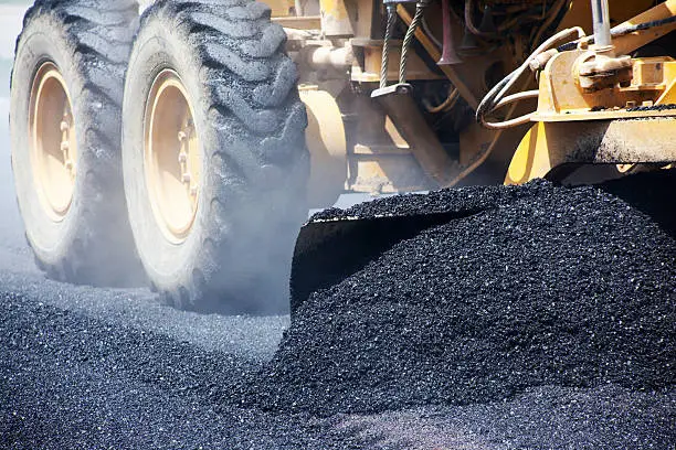 Photo of Laying fresh asphalt