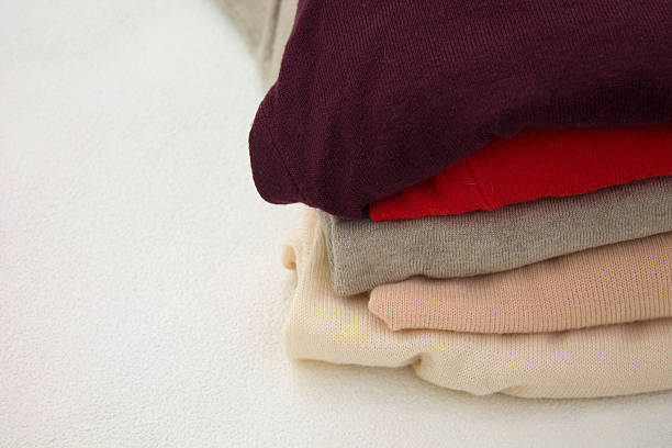 istock Colorful clothes on shelf 507071962