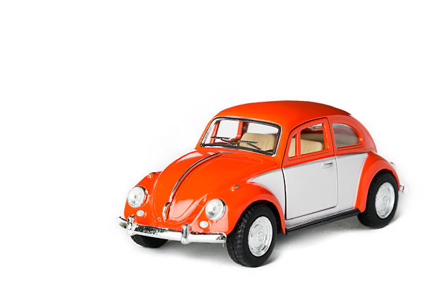 carro de brinquedo laranja - beetle imagens e fotografias de stock