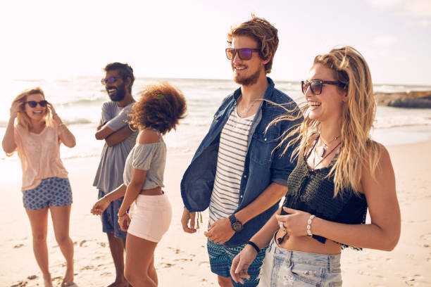 istock Group of friends having fun on the beach 507073918