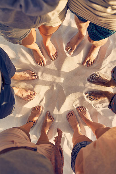 istock Feet of young people standing in a circle 507074156