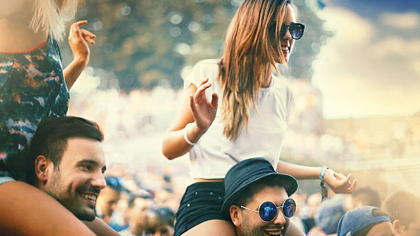 istock People enjoying a concert. 507074568