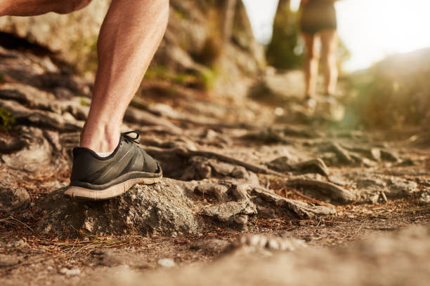 istock Man trail running on rocky terrain 507074868