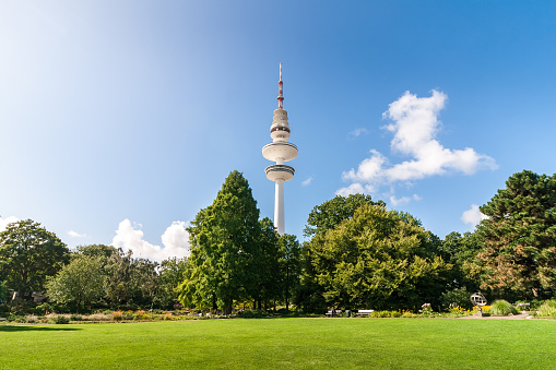 Hamburg Planten un Blomen Stadtpark with TV tower at the fair on a sunny summer day