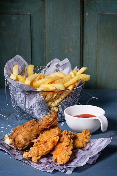 istock Chicken fries with fried potatoes 507076478