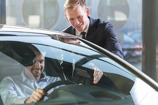istock Car dealer with client 507079318