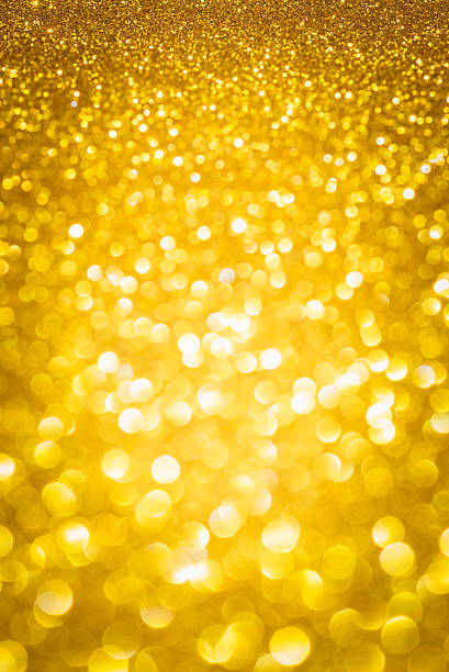 istock Gold glitter bokeh abstract background 507079464
