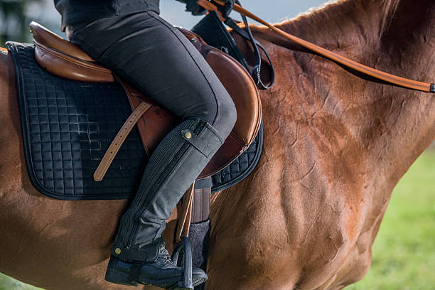 istock Woman riding horse 507079594