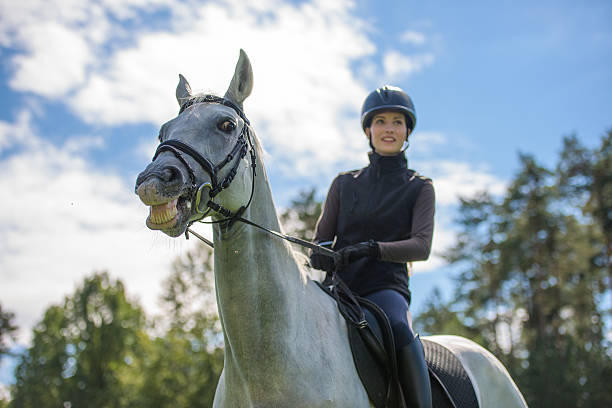 istock Woman riding horse 507081740