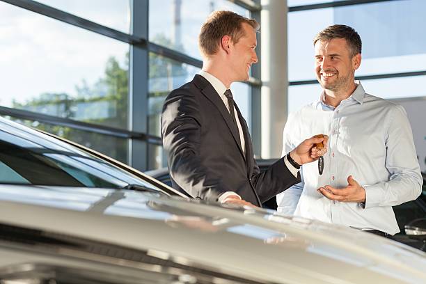 Car dealer selling car
