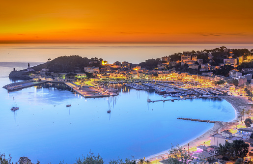 Aerial view on the harbour and town of Port de Soller on Mallorca at dusk