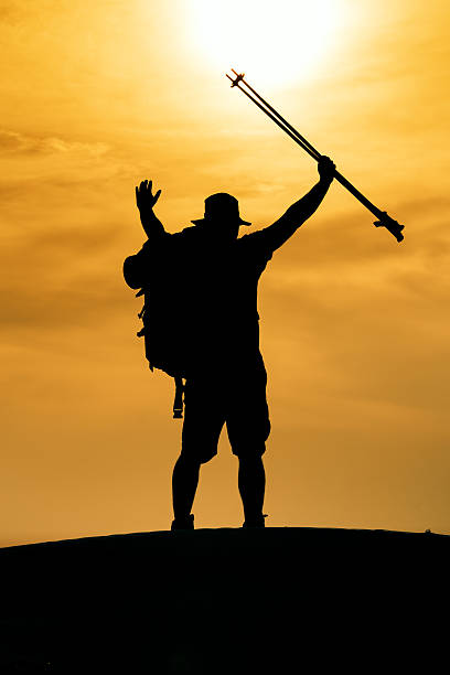 istock Hiking silhouette in mountains 507090765