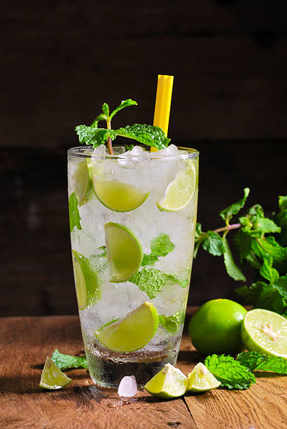 istock Mojito , lime pieces , leaves of mint with ice and rum 507091185