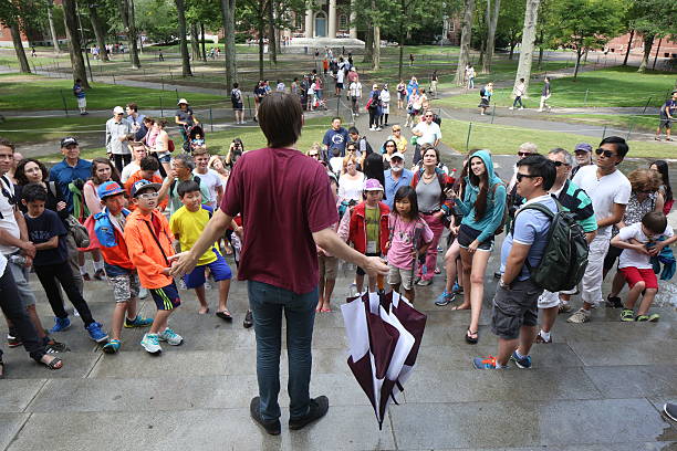 Visitors on Harvard University campus stock photo