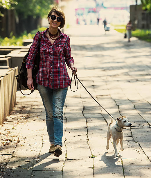 istock woman and dog 507092185