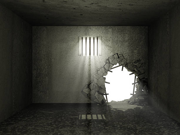 istock Old Grunge Prison Interior with Broken Concrete Wall 507093043