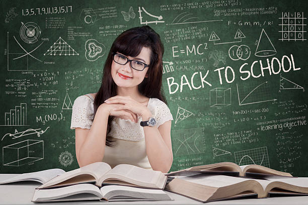 istock Pretty female student in classroom 507093831