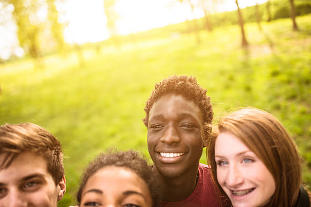 istock Group of college student laughing and doing a selfie 507094155