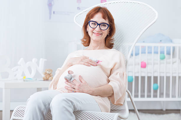 Woman in pregnant stock photo