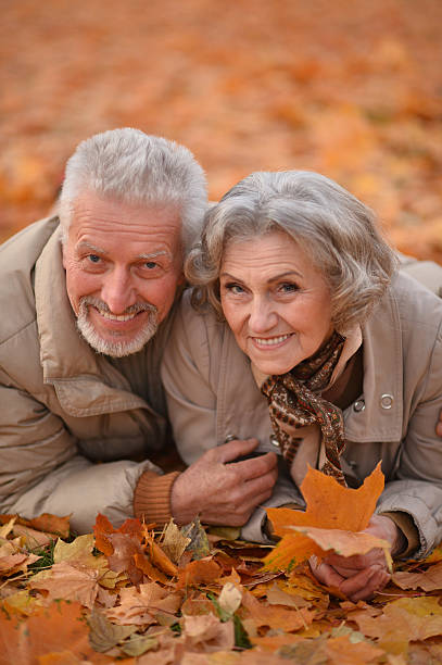 istock Senior couple in autumn park 507106824
