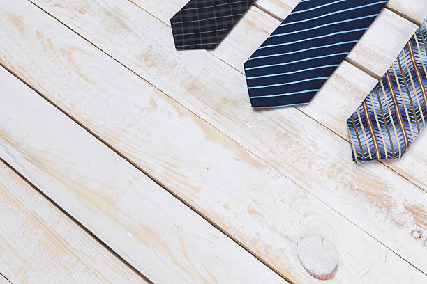 istock Fathers day composition, tie laid on wooden floor. 507108090