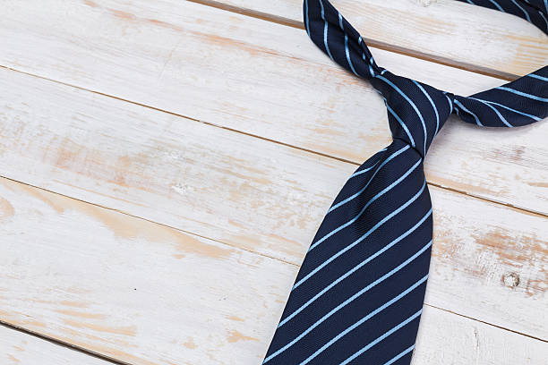 istock Fathers day composition, tie laid on wooden floor. 507108966