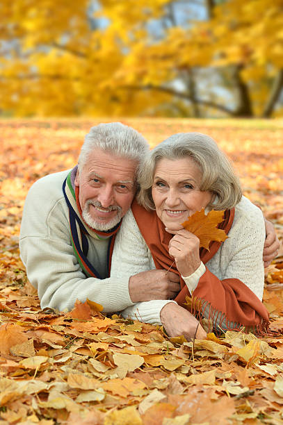 istock Senior couple in autumn park 507109242
