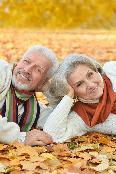 istock Senior couple in autumn park 507110782