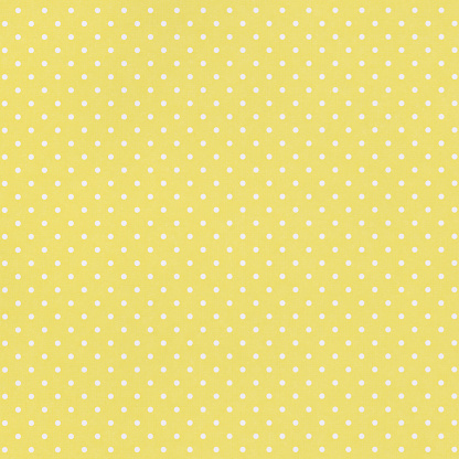 Yellow paper background with polka dot pattern