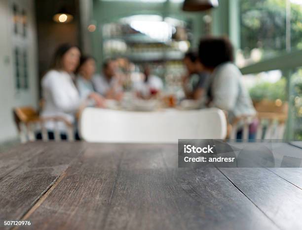 Tablet At A Restaurant Stock Photo - Download Image Now - Table, Defocused, Friendship