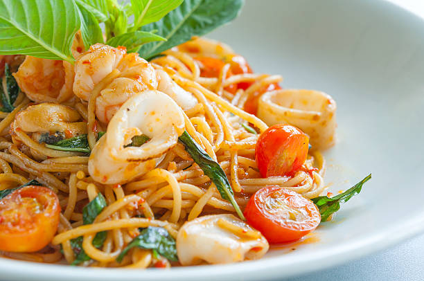 istock spaghetties Spicy Seafood with Sweet Basil 507121594