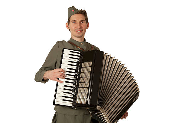 istock Soviet soldier playing the accordion over white 507122374