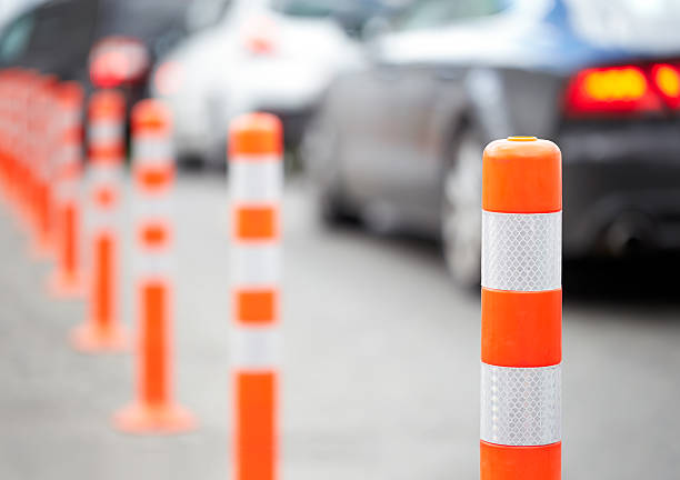 istock Orange bollard on the road. Traffic jam. 507123569