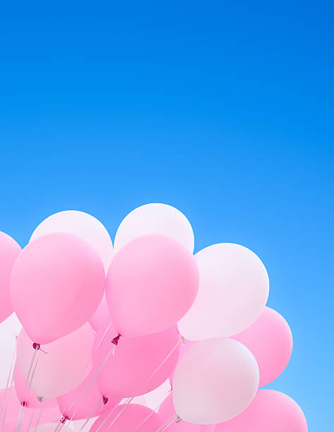 istock festive balloons against the blue sky 507124083