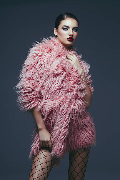 Fashion model in fur coat stock photo
