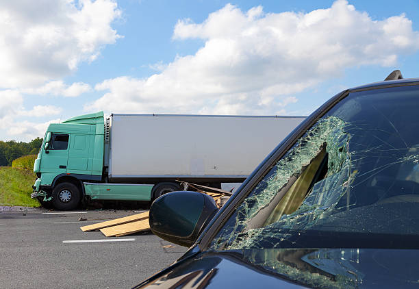 View of truck in an accident with car View of truck in an accident with car, cloudy sky crash stock pictures, royalty-free photos & images