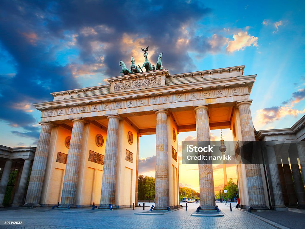 Brandenburg Gate and the TV tower in Berlin Brandenburg Gate and the TV tower at Pariser Platz in Berlin in sunset light Berlin Stock Photo