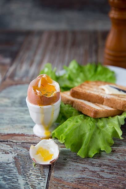 istock Breakfast with egg and toast on a wooden background 507144418