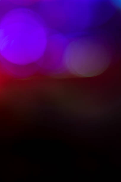 istock Photo of bokeh lights on black background 507145830