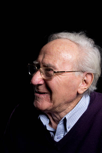 istock senior portrait from the side with glasses 507149104