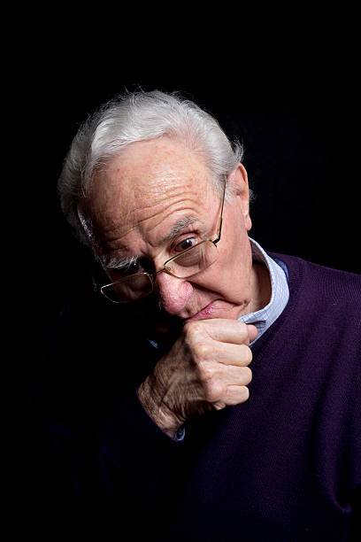 istock senior thinking portrait with glasses 507149250