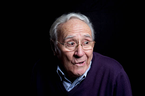 istock surprised senior portrait with glasses 507149432