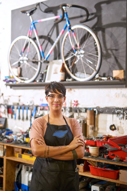istock Female technician in her bicycle repair shop 507149674