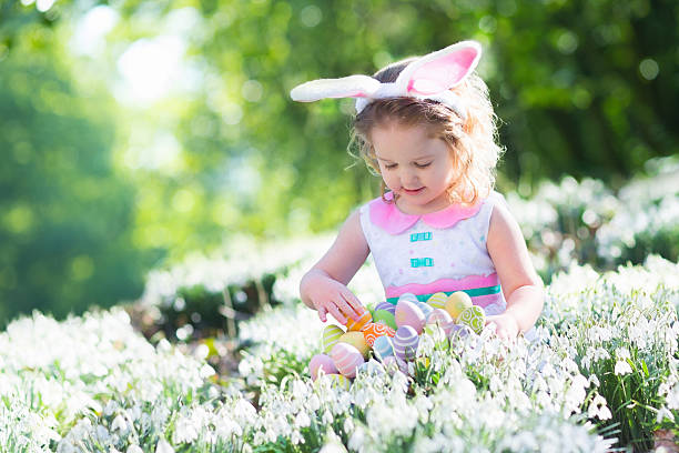 istock Little girl with Easter bunny ears 507149890