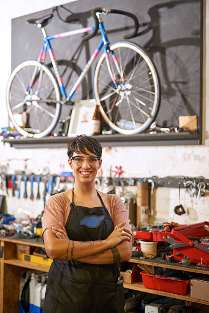 istock Female technician in her bicycle repair shop 507150048