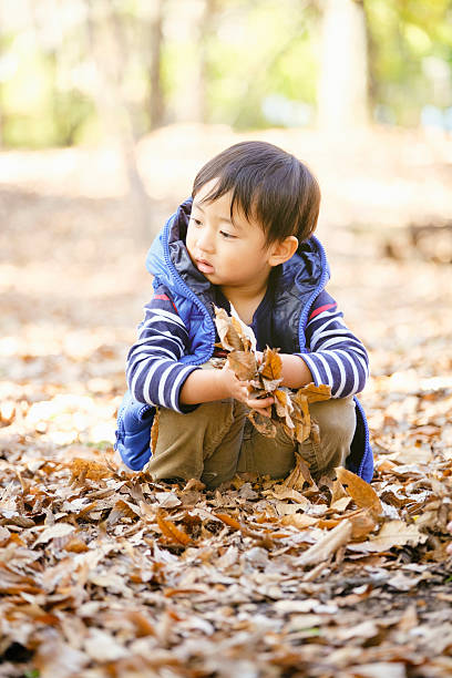 istock Japanese Boy Playing in a Tokyo Park 507150498